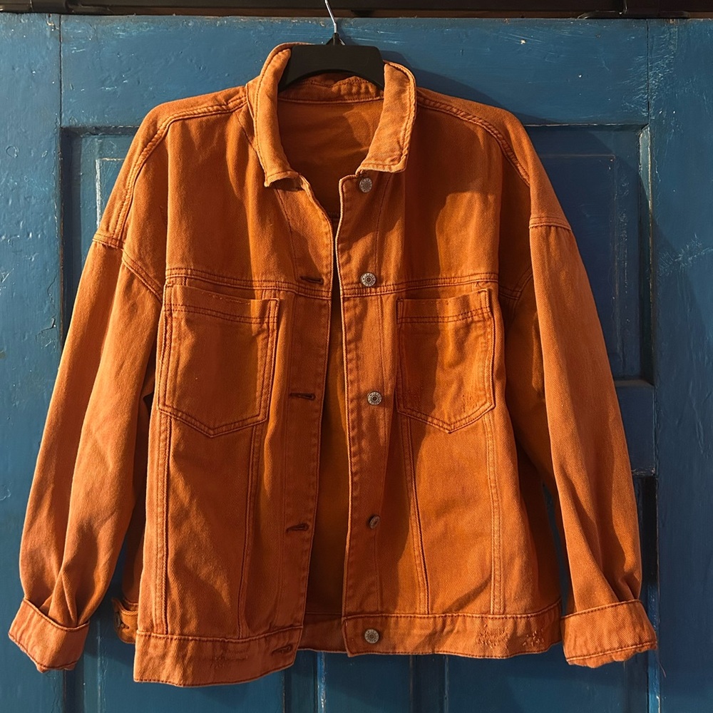 Orange denim jacket. New with tags.